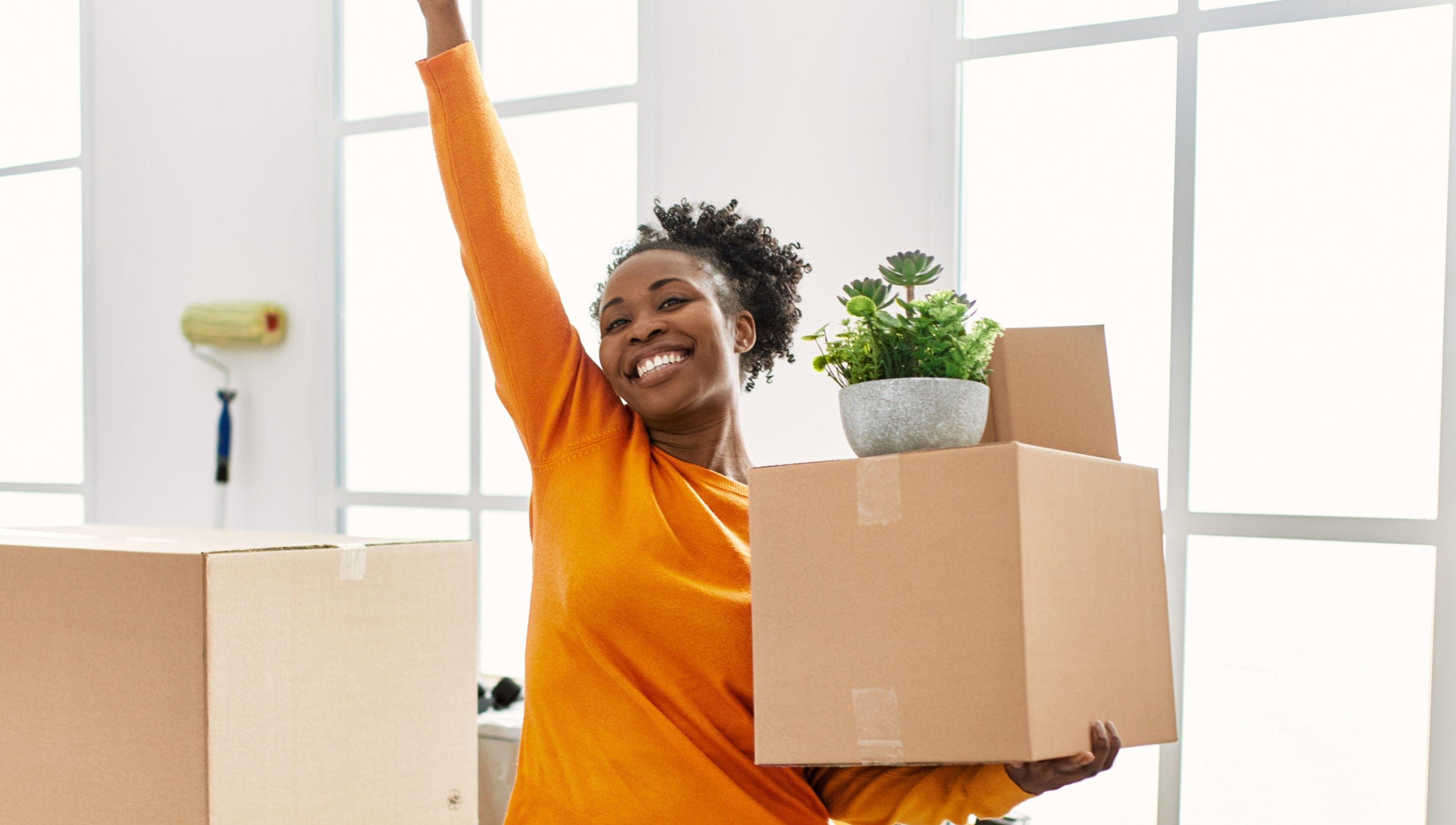 Happy Girl with moving boxes