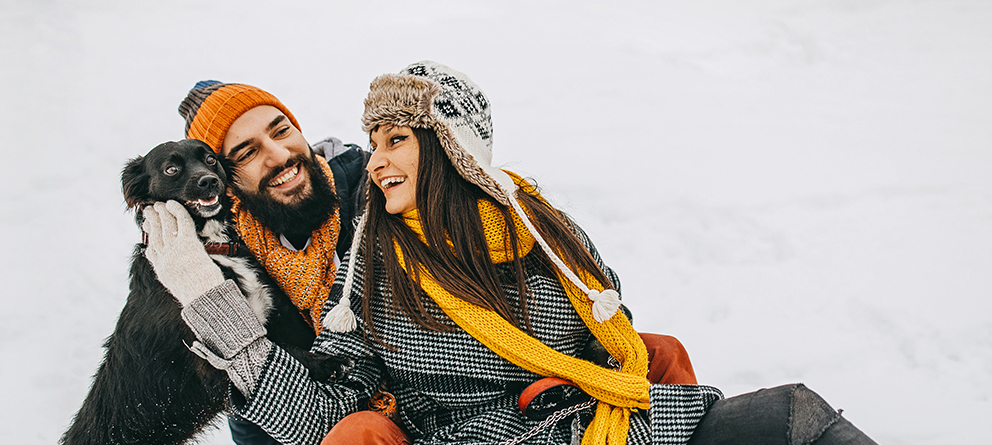 Happy Couple outside with dog