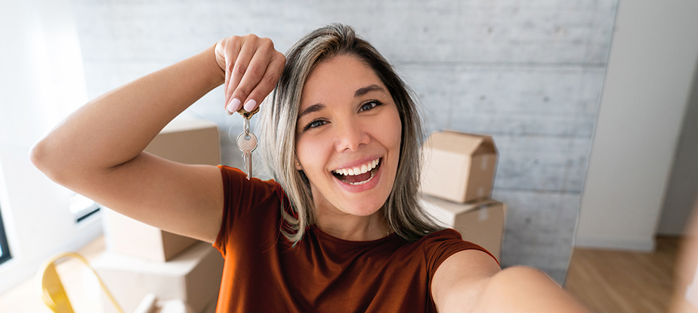 Girl Holding House Keys