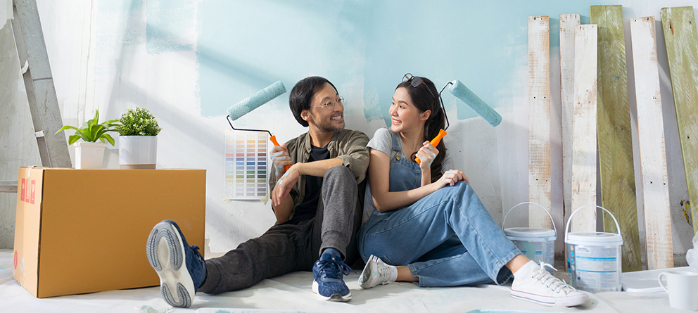 Couple with paint brushes