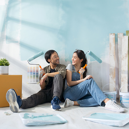 Couple with paint brushes