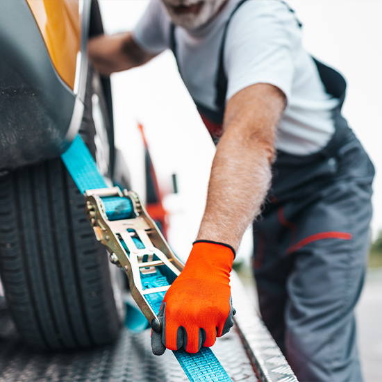 Loading car on tow truck