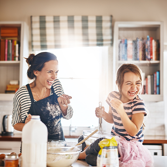 Mother and daughter baking