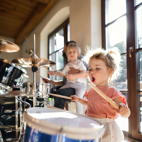 Child playing drums