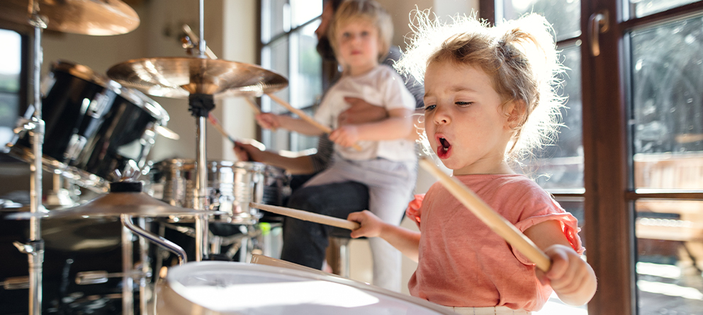 Child playing drums