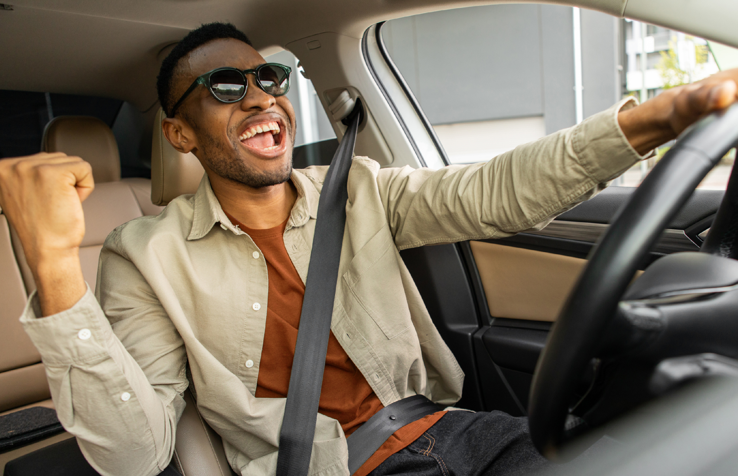 young man driving car